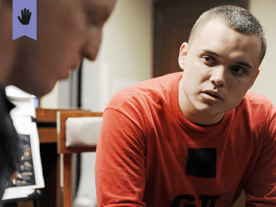 two males having a conversation